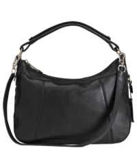 Look gorgeous when you're going places with this laid-back silhouette from Cole Haan. Crafted from posh, pebbled leather with chic silver-tone hardware, its surprisingly spacious interior easily stows all your essentials with ease. Look gorgeous when you're going places with this laid-back silhouette from Cole Haan. Crafted from posh, pebbled leather with chic silver-tone hardware, its surprisingly spacious interior easily stows all your essentials with ease.