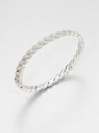 Graceful crystal-set feather shapes come together to form an elegant hinged bangle with shimmer that goes on and on.CrystalRhodium platingDiameter, about 2½Width, about ¼Box-and-tongue claspImported Graceful crystal-set feather shapes come together to form an elegant hinged bangle with shimmer that goes on and on.CrystalRhodium platingDiameter, about 2½Width, about ¼Box-and-tongue claspImported