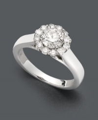Breathtaking beauty. This stunning X3 engagement ring features a certified, round-cut diamond (1 ct. t.w.) encircled by a halo of diamond accents set in 18k white gold. Breathtaking beauty. This stunning X3 engagement ring features a certified, round-cut diamond (1 ct. t.w.) encircled by a halo of diamond accents set in 18k white gold.