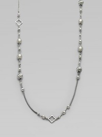 From the Quatrefoil Collection. An extra long sterling silver chain with bead and quatrefoil stations.Sterling silver Can be worn doubled Length, about 48 Lobster clasp closure Imported 