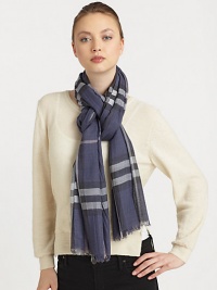 A lightweight wool and silk blend in an iconic check print. 51% wool/49% mulberry silkAbout 28 X 87Dry cleanMade in Italy A lightweight wool and silk blend in an iconic check print. 51% wool/49% mulberry silkAbout 28 X 87Dry cleanMade in Italy