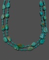 The perfect way to infuse your style with color. This necklace features two rows of off-shape baroque turquoise. Approximate length: 18 inches.