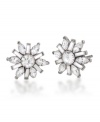 Winter wonderland. Add festive, fashionable flair to your style with Carolee's sparkling snowflake-shaped button earrings. Embellished with glittering glass accents, they're crafted in silver tone mixed metal. Approximate diameter: 1/2 inch.