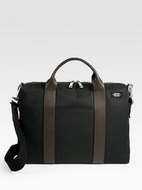 Protect your investments and stay organized with this sturdy briefcase crafted in waxed cotton.Zip closureTop handlesAdjustable shoulder strap16½W x 12H x 3¼DImported Protect your investments and stay organized with this sturdy briefcase crafted in waxed cotton.Zip closureTop handlesAdjustable shoulder strap16½W x 12H x 3¼DImported