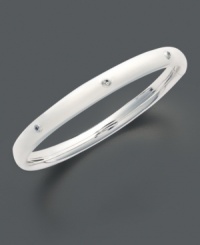 A touch of sweet sparkle for tiny wrists. This children's bangle is crafted in sterling silver with glittering diamond accents. Approximate diameter: 2 inches. A touch of sweet sparkle for tiny wrists. This children's bangle is crafted in sterling silver with glittering diamond accents. Approximate diameter: 2 inches.
