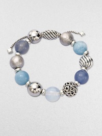 From the Elements Collection. Rich textures and soft shades combine in a stunning strand of 14mm sterling silver, blue chalcedony, aquamarine and moon quartz beads with a silver oval slide clasp.Blue chalcedony, aquamarine and moon quartzSterling silverDiameter, about 2Adjustable slide claspImported