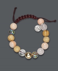 Get fit to be tied. This intricate bracelet features a brown nylon cord strung with 10 mm beads including pink aventurine, rose quartz, picture jasper, and clear quartz. Faceted yellow rondelle crystals, pave-set Colorado topaz-colored crystal balls, and 18k gold over sterling silver accents add the perfect finishing touches. Approximate length: 7-1/2 inches. Get fit to be tied. This intricate bracelet features a brown nylon cord strung with 10 mm beads including pink aventurine, rose quartz, picture jasper, and clear quartz. Faceted yellow rondelle crystals, pave-set Colorado topaz-colored crystal balls, and 18k gold over sterling silver accents add the perfect finishing touches. Approximate length: 7-1/2 inches.