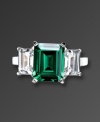 Finish your look with precision style and vibrant color. CRISLU's eye-catching ring highlights an emerald-cut green cubic zirconia center (6 ct. t.w.) with a clear cubic zirconia (2-1/2 ct. t.w.) on either side. Ring crafted in platinum over sterling silver. Sizes 5, 6, 7, 8, and 9.