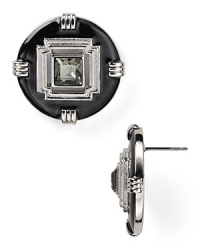 A simple yet no less stunning T Tahari style, these button earrings beg for major rotation with bold crystal stones tucked inside classic plated metal detailing. A simple yet no less stunning T Tahari style, these button earrings beg for major rotation with bold crystal stones tucked inside classic plated metal detailing.