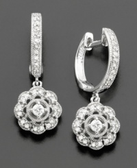 A floral-shaped burst of diamonds (1/3 ct. t.w.) adorn 14k white gold in these fine earrings. The perfect pair to add a little glamor to every day. A floral-shaped burst of diamonds (1/3 ct. t.w.) adorn 14k white gold in these fine earrings. The perfect pair to add a little glamor to every day.
