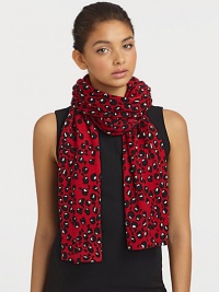 A warm knitted wool design with a bold and fun print. WoolAbout 12 X 86Dry cleanImported A warm knitted wool design with a bold and fun print. WoolAbout 12 X 86Dry cleanImported