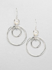 From the Scultura Collection. Circular sterling silver hoops accented with luminous mother-of-pearl in a pretty drop design. Mother-of-pearlSterling silverDrop, about 1.9Hook backImported From the Scultura Collection. Circular sterling silver hoops accented with luminous mother-of-pearl in a pretty drop design. Mother-of-pearlSterling silverDrop, about 1.9Hook backImported