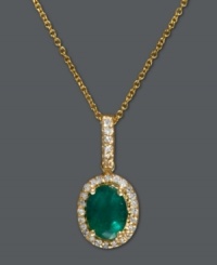 Effy Collection is known for their envy-inducing elegance, and this stunning pendant is no exception. An oval-cut emerald (1-3/8 ct. t.w.) encircled by round-cut diamonds (1/6 ct. t.w.) is sure to turn heads. Crafted in 14k gold. Approximate length: 18 inches. Approximate drop length: 3/4 inch. Approximate drop width: 1/3 inch. Effy Collection is known for their envy-inducing elegance, and this stunning pendant is no exception. An oval-cut emerald (1-3/8 ct. t.w.) encircled by round-cut diamonds (1/6 ct. t.w.) is sure to turn heads. Crafted in 14k gold. Approximate length: 18 inches. Approximate drop length: 3/4 inch. Approximate drop width: 1/3 inch.