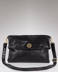 Get easy chic with this everyday essential messenger bag in glossy leather from Tory Burch. Get easy chic with this everyday essential messenger bag in glossy leather from Tory Burch.