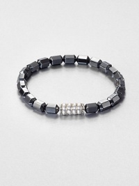 The Bedeg collection celebrates the simple, yet exquisite Indonesian artisanship found in woven bamboo with a modern design interpretation captured in traditional techniques. This beaded style is designed in sterling silver with hematite.Sterling silverHematitePusher claspDiameter, about 6Imported The Bedeg collection celebrates the simple, yet exquisite Indonesian artisanship found in woven bamboo with a modern design interpretation captured in traditional techniques. This beaded style is designed in sterling silver with hematite.Sterling silverHematitePusher claspDiameter, about 6Imported