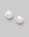 From the Akoya Collection. Classic white cultured pearl studs set in 18k gold. 8mm white round cultured pearls Quality: A 18k white gold Post back Imported