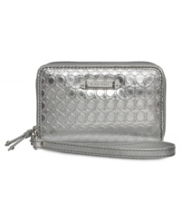Give your gadget a shining moment with this faux patent tech case from Nine West. Decked out in signature 9s and gleaming hardware, its pocket-lined interior easily stows phone, cash, cards and ID. Give your gadget a shining moment with this faux patent tech case from Nine West. Decked out in signature 9s and gleaming hardware, its pocket-lined interior easily stows phone, cash, cards and ID.