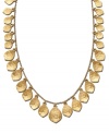 Adorn your neckline with cascading shimmery leaves. This autumn-inspired necklace from the Lauren by Ralph Lauren collection features a plethora of dangling leaf charms of varying size and texture. Crafted in gold tone mixed metal. Approximate length: 18 inches. Approximate drop: 1-1/2 inches.