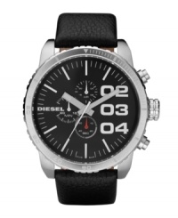 If bigger is better, this black-on-black watch by Diesel is the best. Black leather strap and oversized round stainless steel case, 58x52mm. Black chronograph dial features silver tone numerals, stick indices, minute track, three subdials, luminous hands and logo. Quartz movement. Water resistant to 50 meters. Two-year limited warranty. If bigger is better, this black-on-black watch by Diesel is the best. Black leather strap and oversized round stainless steel case, 58x52mm. Black chronograph dial features silver tone numerals, stick indices, minute track, three subdials, luminous hands and logo. Quartz movement. Water resistant to 50 meters. Two-year limited warranty.