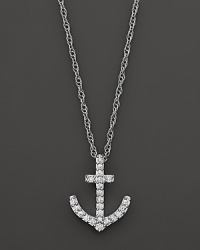 This diamond anchor pendant is crafted from 14k white gold and hangs from a 17 cable chain. This diamond anchor pendant is crafted from 14k white gold and hangs from a 17 cable chain.