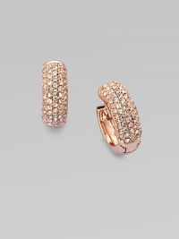 Dazzle in these petite huggie hoops accented with sparkling rhinestones. Brass and sterling silverGlass stonesLength, about ½Hinge-and-post backImported Dazzle in these petite huggie hoops accented with sparkling rhinestones. Brass and sterling silverGlass stonesLength, about ½Hinge-and-post backImported