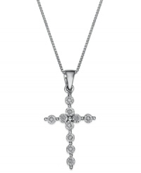 A shining reflection of your faith. This beautiful cross pendant features a delicate design accented by diamonds. Set in sterling silver. Approximate length: 18 inches. Approximate drop: 1 inch. A shining reflection of your faith. This beautiful cross pendant features a delicate design accented by diamonds. Set in sterling silver. Approximate length: 18 inches. Approximate drop: 1 inch.