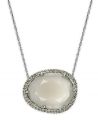 Inspired by nature, this stunning pendant highlights an organically-shaped moonstone (7-5/8 ct. t.w.) surrounded by round-cut diamonds (1/4 ct. t.w.). Set in sterling silver. Approximate length: 18 inches. Approximate drop: 1/2 inch. Inspired by nature, this stunning pendant highlights an organically-shaped moonstone (7-5/8 ct. t.w.) surrounded by round-cut diamonds (1/4 ct. t.w.). Set in sterling silver. Approximate length: 18 inches. Approximate drop: 1/2 inch.