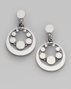 From the Dot Collection. This striking design of sterling silver circles is at once modern and classic.Sterling silver Length, about 1½ Width, about 1 Post and nut back Imported