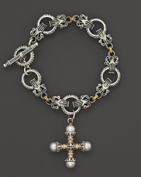 An etched sterling silver and 18K yellow gold link bracelet embellished with a pearl-accented cross. By Konstantino. An etched sterling silver and 18K yellow gold link bracelet embellished with a pearl-accented cross. By Konstantino.