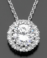Let this beautiful pendant light up your outfit with dramatic luster. Featuring cubic zirconia (1 ct. t.w.) surrounded by crystal accents set in rhodium-plated goldtone mixed metal. Measures approximately 16 inches with a 2-inch extender. Let this beautiful pendant light up your outfit with dramatic luster. Featuring cubic zirconia (1 ct. t.w.) surrounded by crystal accents set in rhodium-plated goldtone mixed metal. Measures approximately 16 inches with a 2-inch extender.