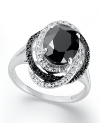 Mysterious brilliance. A stunning oval-cut onyx (8mm x 10mm) makes a captivating focal point in this formal ring amidst swirled bands of white diamonds (1/10 ct. t.w.) and black diamonds (1/10 ct. t.w.). Ring set in sterling silver. Size 7. Mysterious brilliance. A stunning oval-cut onyx (8mm x 10mm) makes a captivating focal point in this formal ring amidst swirled bands of white diamonds (1/10 ct. t.w.) and black diamonds (1/10 ct. t.w.). Ring set in sterling silver. Size 7.