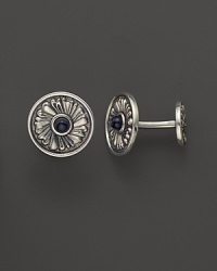 Elegant, intricately textured sterling silver cufflinks, set with onyx, from Buccellati. Elegant, intricately textured sterling silver cufflinks, set with onyx, from Buccellati.