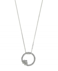 Eternal design accented by just the right amount of sparkle. 2028 pendant features a cut-out circular style accented by a chic flower and acrylic stones. Setting and chain crafted in silver tone mixed metal. Approximate length: 16 inches + 3-inch extender. Approximate drop: 1-1/4 inches. Eternal design accented by just the right amount of sparkle. 2028 pendant features a cut-out circular style accented by a chic flower and acrylic stones. Setting and chain crafted in silver tone mixed metal. Approximate length: 16 inches + 3-inch extender. Approximate drop: 1-1/4 inches.