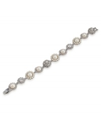 The perfect combination of elegance and grace. This frosty white bracelet by Carolee features glass crystal stones and glass pearls. Crafted in rhodium-plated mixed metal. Approximate length: 7-3/4 inches. The perfect combination of elegance and grace. This frosty white bracelet by Carolee features glass crystal stones and glass pearls. Crafted in rhodium-plated mixed metal. Approximate length: 7-3/4 inches.