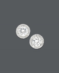 For the girl with impeccable taste. Stunning stud earrings highlight round-cut diamond centers surrounded by a halo of round-cut diamond accents (1/2 ct. t.w.). Set in 14k white gold. Approximate diameter: 4 mm. For the girl with impeccable taste. Stunning stud earrings highlight round-cut diamond centers surrounded by a halo of round-cut diamond accents (1/2 ct. t.w.). Set in 14k white gold. Approximate diameter: 4 mm.
