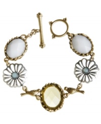 Chirp, twitter or tweet it loud and clear...bird is the word! Lucky Brand's vintage-inspired bracelet style combines intricate cut-out flowers, bezel set stones, and petite bird charms all-in-one. Crafted in silver and gold tone mixed metal with plastic and glass beads and a trendy toggle clasp. Approximate length: 7-3/4 inches. Chirp, twitter or tweet it loud and clear...bird is the word! Lucky Brand's vintage-inspired bracelet style combines intricate cut-out flowers, bezel set stones, and petite bird charms all-in-one. Crafted in silver and gold tone mixed metal with plastic and glass beads and a trendy toggle clasp. Approximate length: 7-3/4 inches.