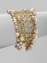 A chain link design embellished with multi-colored glass pearls. BrassGlass pearlsLength, about 7½Magnetic clasp closureImported 