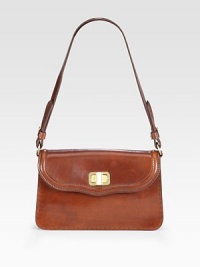 Rich saddle leather in a graceful, classic shape with a front turnlock flap.Shoulder strap, 10 drop Turnlock flap closure One inside zip pocket Suede lining 9½W X 6H X 2D Made in Italy Rich saddle leather in a graceful, classic shape with a front turnlock flap.Shoulder strap, 10 drop Turnlock flap closure One inside zip pocket Suede lining 9½W X 6H X 2D Made in Italy