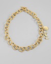 Bold, textured golded links are accented with two YSL logo charms. Goldtone Length, about 13 Toggle closure Made in Italy