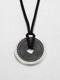 From the Classic Chain Collection. The center of this striking pendant has the look of an ancient coin with its square hole and blackened finish, set in a distinctive carved setting of polished sterling silver and hanging from a black cord.Sterling silverBlack fabric cordCord length, about 22 to 24 (adjustable)Pendant diameter, about 1.75Lobster claspMade in Bali From the Classic Chain Collection. The center of this striking pendant has the look of an ancient coin with its square hole and blackened finish, set in a distinctive carved setting of polished sterling silver and hanging from a black cord.Sterling silverBlack fabric cordCord length, about 22 to 24 (adjustable)Pendant diameter, about 1.75Lobster claspMade in Bali