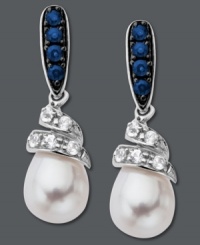 Dabble in a fresh, new design. These swirling drop earrings feature round-cut blue sapphires at the post (1/4 ct. t.w.) and round-cut white sapphires (1/5 ct. t.w) that cradle a shimmering cultured freshwater pearl (7 mm x 9 mm). Crafted in sterling silver. Approximate drop: 9/10 inch.
