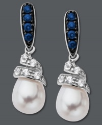 Dabble in a fresh, new design. These swirling drop earrings feature round-cut blue sapphires at the post (1/4 ct. t.w.) and round-cut white sapphires (1/5 ct. t.w) that cradle a shimmering cultured freshwater pearl (7 mm x 9 mm). Crafted in sterling silver. Approximate drop: 9/10 inch. Dabble in a fresh, new design. These swirling drop earrings feature round-cut blue sapphires at the post (1/4 ct. t.w.) and round-cut white sapphires (1/5 ct. t.w) that cradle a shimmering cultured freshwater pearl (7 mm x 9 mm). Crafted in sterling silver. Approximate drop: 9/10 inch.