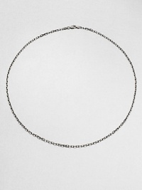 A charming, link chain necklace is constructed in gleaming sterling silver with a lobster claw and loop clasp.Sterling silverLobster claw/loop claspAbout 22 longMade in USA A charming, link chain necklace is constructed in gleaming sterling silver with a lobster claw and loop clasp.Sterling silverLobster claw/loop claspAbout 22 longMade in USA
