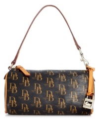 A blast from the past, this mini must-have from Dooney & Bourke gives a nod to its '70s signature style. Adorned with the iconic DB monogram and discrete hardware, its sized-right for just the essentials. A blast from the past, this mini must-have from Dooney & Bourke gives a nod to its '70s signature style. Adorned with the iconic DB monogram and discrete hardware, its sized-right for just the essentials.