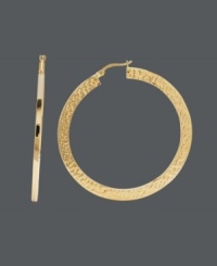 Nothing says classic and cool like the perfect pair of hoops. This trendy style features a unique hammered design on a flat surface. Crafted in 14k gold. Approximate diameter: 1-9/10 inches. Nothing says classic and cool like the perfect pair of hoops. This trendy style features a unique hammered design on a flat surface. Crafted in 14k gold. Approximate diameter: 1-9/10 inches.