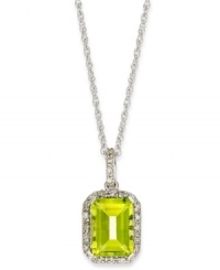 A green sensation. This unique emerald-cut peridot pendant (2 ct. t.w.) stands out against a halo of round-cut diamond accents. Set in 10k white gold. Approximate length: 18 inches. Approximate drop: 3/4 inch. A green sensation. This unique emerald-cut peridot pendant (2 ct. t.w.) stands out against a halo of round-cut diamond accents. Set in 10k white gold. Approximate length: 18 inches. Approximate drop: 3/4 inch.