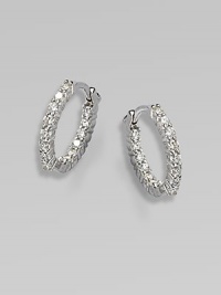 A brilliant, diamond encrusted design in a sweet and subtle size. Diamonds, .76 tcw18k white goldLength, about ½Hinge-and-post backMade in Italy A brilliant, diamond encrusted design in a sweet and subtle size. Diamonds, .76 tcw18k white goldLength, about ½Hinge-and-post backMade in Italy