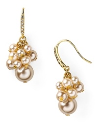 Carolee's punchy jewels are in perfect step with fashion's love of statement baubles. Get the look with this pair of clustered pearl drop earrings, accented by gold chain. Carolee's punchy jewels are in perfect step with fashion's love of statement baubles. Get the look with this pair of clustered pearl drop earrings, accented by gold chain.
