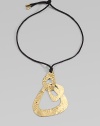 Artful and elegant interlocking organic shapes, rendered in gleaming, hammered brass.BrassCotton cording Length, about 14Pendant, about 3½W X 5HTie closure with brass tipsImported