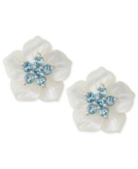 Say it with flowers. This pair of sterling silver earrings, with white mother of pearl (16 mm) and round-cut blue topaz (1 ct. t.w.), expresses elegance. Approximate diameter: 5/8 inch. Say it with flowers. This pair of sterling silver earrings, with white mother of pearl (16 mm) and round-cut blue topaz (1 ct. t.w.), expresses elegance. Approximate diameter: 5/8 inch.